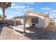Covered patio adjacent to the house, perfect for grilling and relaxing at 4634 Skybolt St, Las Vegas, NV 89115