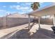 Covered patio, great for outdoor entertaining, with a small yard and block wall at 4634 Skybolt St, Las Vegas, NV 89115