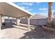 Covered patio, great for outdoor entertaining, with a small yard and block wall at 4634 Skybolt St, Las Vegas, NV 89115