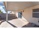 Covered patio with adjacent sliding doors leading to the interior at 4634 Skybolt St, Las Vegas, NV 89115