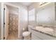 Clean bathroom with single sink vanity and shower/tub combo at 4634 Skybolt St, Las Vegas, NV 89115