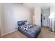 Cozy bedroom with a full-size bed and ample closet space at 4634 Skybolt St, Las Vegas, NV 89115