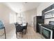 Bright dining area with a table for six and access to the backyard at 4634 Skybolt St, Las Vegas, NV 89115