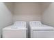 Neat laundry area with side-by-side washer and dryer at 4634 Skybolt St, Las Vegas, NV 89115