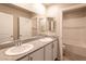 Clean bathroom with double vanity and bathtub at 487 Via Renata, Henderson, NV 89044