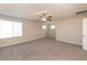 Large bedroom with ceiling fan and neutral carpeting at 487 Via Renata, Henderson, NV 89044