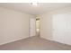 Well-lit bedroom featuring carpet and an additional room at 487 Via Renata, Henderson, NV 89044