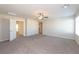 Spacious bedroom with neutral decor and carpeting at 487 Via Renata, Henderson, NV 89044