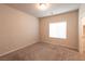 Spacious bedroom with carpet and large window at 487 Via Renata, Henderson, NV 89044