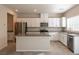 Modern kitchen featuring stainless steel appliances and granite countertops at 487 Via Renata, Henderson, NV 89044