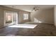 Spacious living room with tile floors and sliding door at 487 Via Renata, Henderson, NV 89044