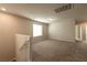Spacious loft area with neutral carpeting and large window at 487 Via Renata, Henderson, NV 89044