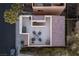 Birds-eye view of a charming patio space featuring outdoor seating and desert landscaping at 9331 Hilgard Ave, Las Vegas, NV 89178
