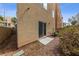 Small backyard with sliding glass door access to a cozy patio area at 9331 Hilgard Ave, Las Vegas, NV 89178