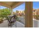 Comfortable balcony featuring outdoor seating with views of the street at 9331 Hilgard Ave, Las Vegas, NV 89178