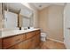 Well-lit bathroom featuring a large vanity and ample storage space at 9331 Hilgard Ave, Las Vegas, NV 89178