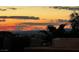 Beautiful sunset view from a rooftop deck overlooking the city and mountains at 9331 Hilgard Ave, Las Vegas, NV 89178
