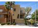 Beautiful two-story home featuring a modern exterior design and a well-manicured front yard at 9331 Hilgard Ave, Las Vegas, NV 89178