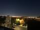 Stunning night view of the city lights from a rooftop deck at 9331 Hilgard Ave, Las Vegas, NV 89178