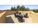Charming outdoor patio with seating and grill perfect for outdoor entertaining and dining al fresco at 9331 Hilgard Ave, Las Vegas, NV 89178