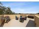 Comfortable rooftop deck setup with outdoor seating and a grill, perfect for entertaining at 9331 Hilgard Ave, Las Vegas, NV 89178