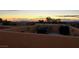 Outdoor rooftop terrace featuring patio seating and a grill with sunset views at 9331 Hilgard Ave, Las Vegas, NV 89178
