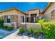 Elegant home exterior with stone accents and a welcoming entryway at 10077 Clifton Forge Ave, Las Vegas, NV 89148