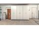 Garage with built-in storage cabinets and extra space at 1046 Weatherboard St, Henderson, NV 89011