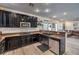 Open concept kitchen featuring stainless steel appliances and granite countertops at 10466 Smokewood Rd, Las Vegas, NV 89135