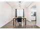 Modern dining area with hardwood floors and kitchen views at 10521 Ettenmoor Ave, Las Vegas, NV 89135