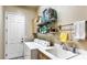 Laundry room with washer, dryer, and ample storage space at 10534 Torre De Nolte St, Las Vegas, NV 89141