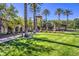 Resort-style courtyard with fountain and palm trees at 11000 Mckendrec Ct, Las Vegas, NV 89134