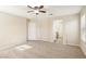 Bright bedroom with ensuite bathroom access and ceiling fan at 1132 Highbury Grove St, Henderson, NV 89002