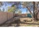 Large backyard with dirt and a brick barbecue at 1200 Cashman Dr, Las Vegas, NV 89102