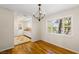 Bright dining room with hardwood floors and kitchen view at 1200 Cashman Dr, Las Vegas, NV 89102