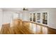 Open concept living area with hardwood floors and doors to patio at 1200 Cashman Dr, Las Vegas, NV 89102