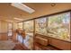 Covered patio with terracotta flooring and access to backyard at 1200 Cashman Dr, Las Vegas, NV 89102