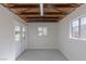 Studio with double doors, window, and exposed beams at 1200 Cashman Dr, Las Vegas, NV 89102