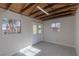 Studio featuring double doors, windows and wood beams at 1200 Cashman Dr, Las Vegas, NV 89102