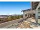 Stunning rooftop patio boasting panoramic views and seating area at 12125 Edgehurst Ct, Las Vegas, NV 89138