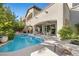 Inviting pool and spa with spacious patio and seating at 12125 Edgehurst Ct, Las Vegas, NV 89138