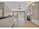 Bright living room with tile floors, fireplace, and sliding glass doors at 1612 Indian Cove Ln, Las Vegas, NV 89128