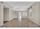 Open and spacious living room with tile floors and natural light at 1612 Indian Cove Ln, Las Vegas, NV 89128