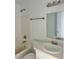Bathroom features a tub, toilet, and vanity with a sink at 1881 Big Horn St, Pahrump, NV 89048
