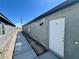 Inviting exterior of a unit showcasing a private entrance with modern outdoor lighting at 1881 Big Horn St, Pahrump, NV 89048