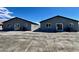 Charming single-story duplex featuring matching units and a spacious parking area at 1881 Big Horn St, Pahrump, NV 89048