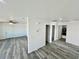 Hallway featuring modern floors and neutral paint connecting to living areas and bedrooms at 1881 Big Horn St, Pahrump, NV 89048