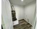 The utility room features wood-look vinyl flooring and a water heater at 1881 Big Horn St, Pahrump, NV 89048