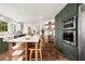 Modern kitchen with stainless steel appliances and a large island at 2031 Mondo Ct, Las Vegas, NV 89123