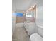 Clean bathroom with tub, vanity, and updated flooring at 2736 Taylor Ave, North Las Vegas, NV 89030